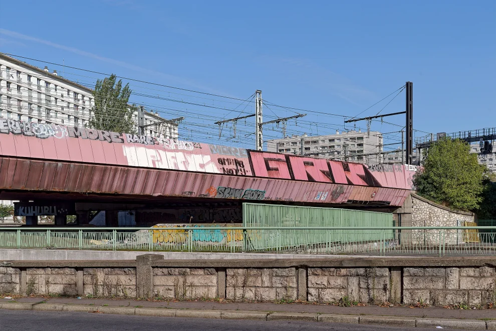 A railroad bridge crosses over a road - Photography by Ralf Hatzmann, a master’s student at the Düsseldorf Academy of Fine Arts, through the lens of psychogeography